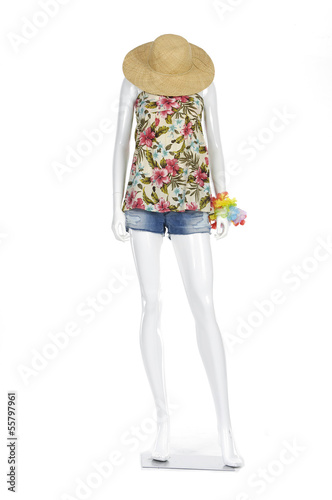 female fashion sundress clothes in hat on a mannequin