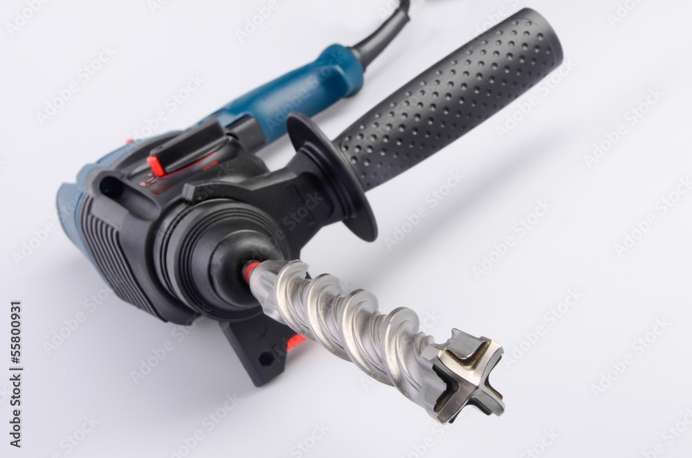 Electric drilling machine on a white background Electric drilling machine on a white background
