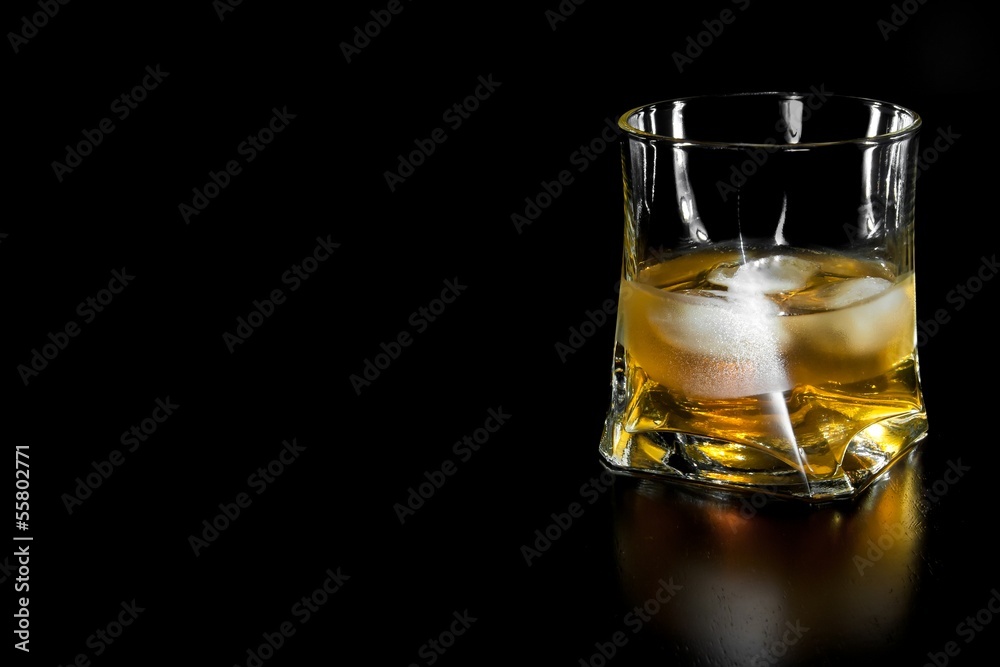 glass of whiskey with ice with space for text glass of whiskey with ice with space for text