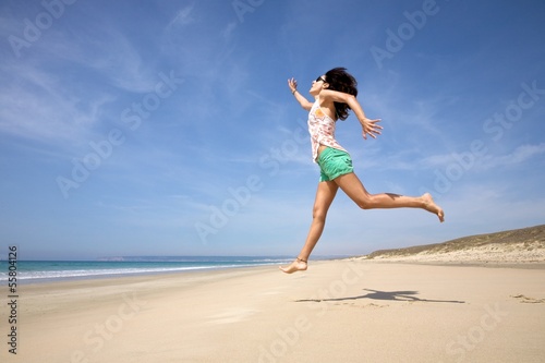 big jump on sandy beach