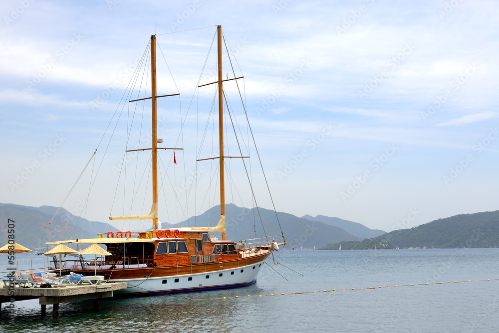 Sail yacht near beach on turkish resort, Marmaris, Turkey