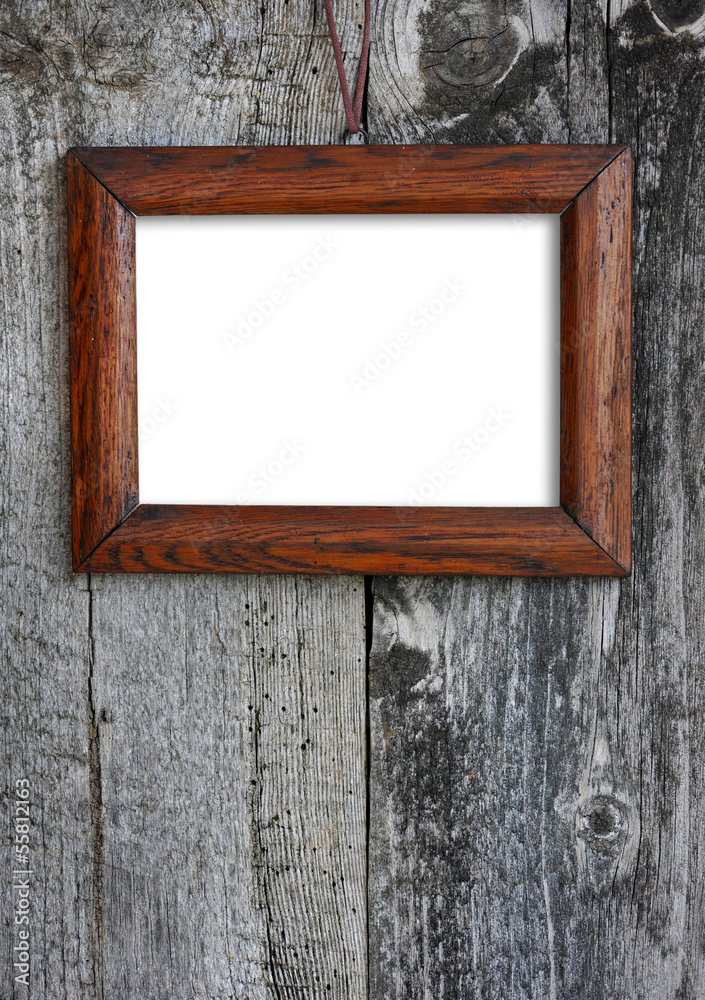 Old wooden frame on a old wooden wall Old wooden frame on a old wooden wall