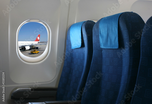 airplane seat and window