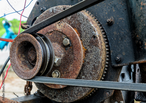 Old pulley and belt of the lawnmower