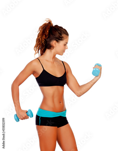 Beautiful woman do toning exercises with dumbbells