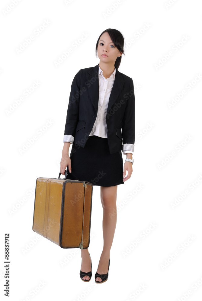 Single business girl holding old traveling case Single business girl holding old traveling case