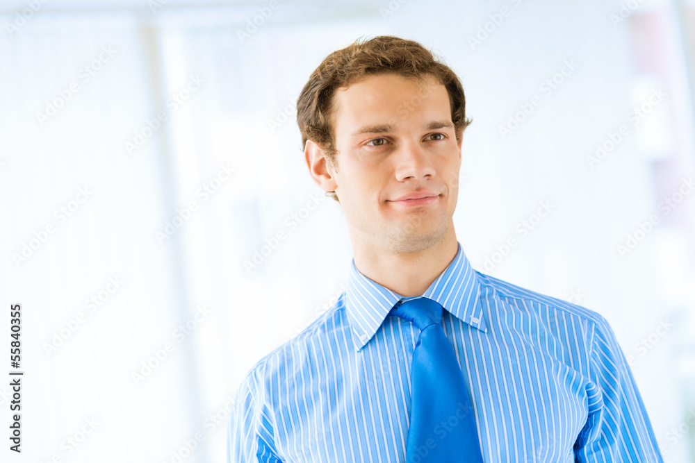 Portrait of a businessman in office Portrait of a businessman in office