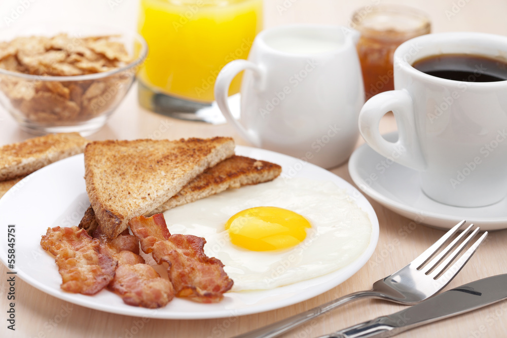 traditional breakfast with fried egg and bacon traditional breakfast with fried egg and bacon