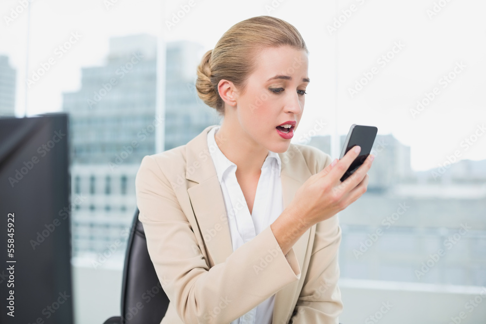 Furious attractive businesswoman on the phone Furious attractive businesswoman on the phone