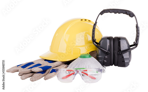Safety equipment or PPE - personal protective equipment - with hard hat, safety glasses, gloves, face mask and earmuffs isolated on white background photo