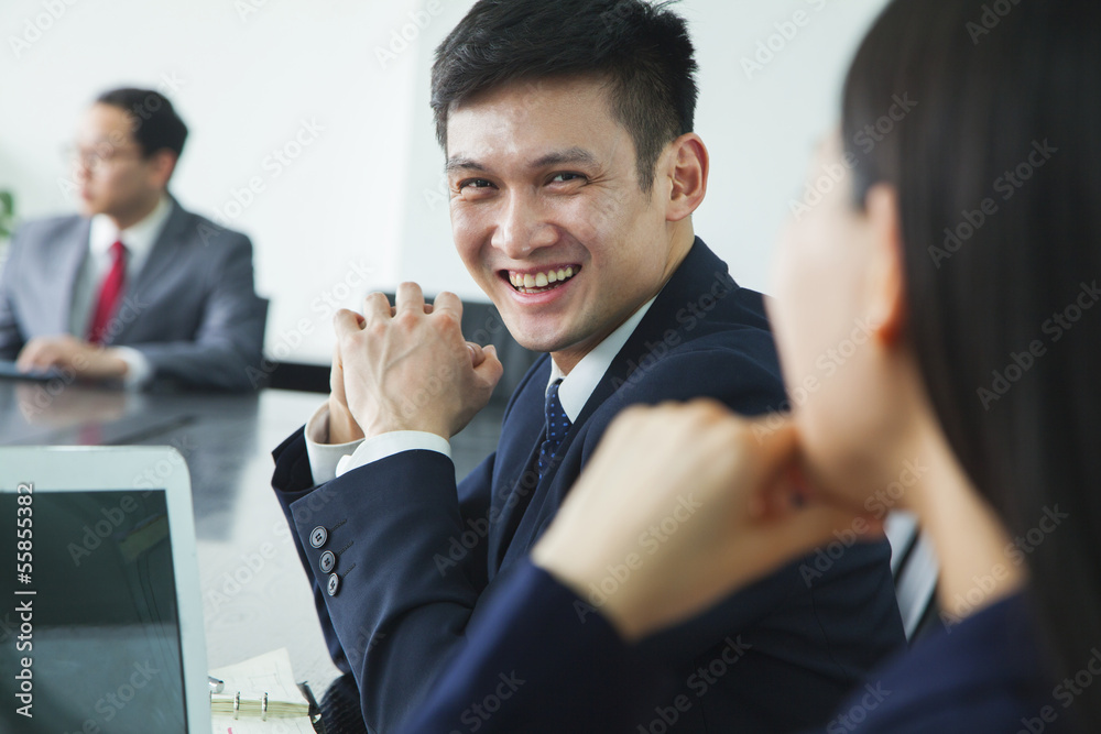 Businessman Smiling and Looking at Camera Businessman Smiling and Looking at Camera