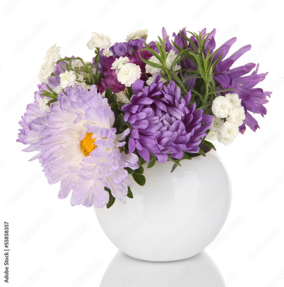 Obraz premium Beautiful bouquet of bright flowers in glass vase, isolated