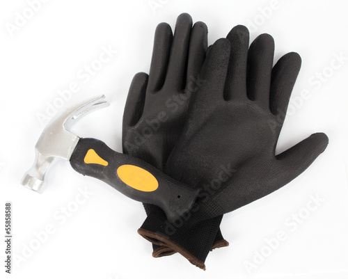hammer and black protective nitrile gloves on white background
