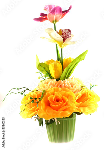 Fototapeta Naklejka Na Ścianę i Meble -  Multicolored flowers in a vase, isolated on white background