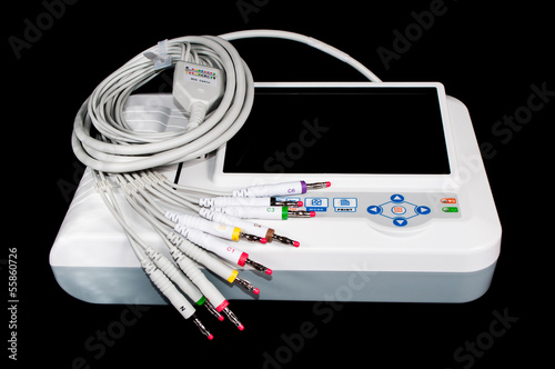 ECG machine isolated on black.