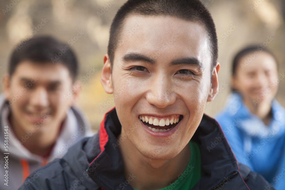 Young man smiling, portrait Young man smiling, portrait