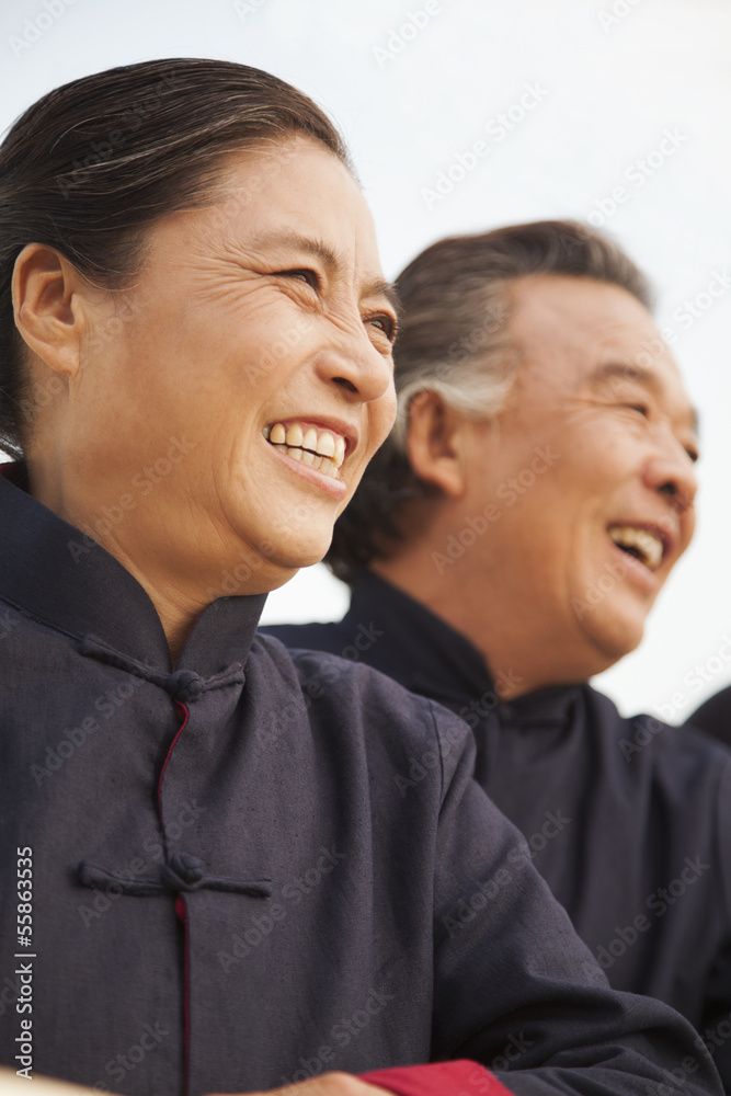 Senior couple dressed in traditional Chinese clothing, portrait Senior couple dressed in traditional Chinese clothing, portrait