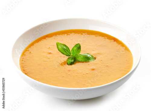 bowl of squash soup with basil