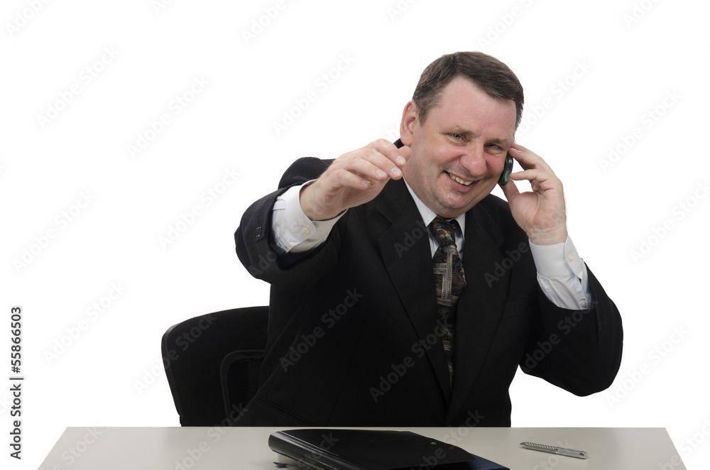 Happy middle-aged businessman with mobile phone Happy middle-aged businessman with mobile phone