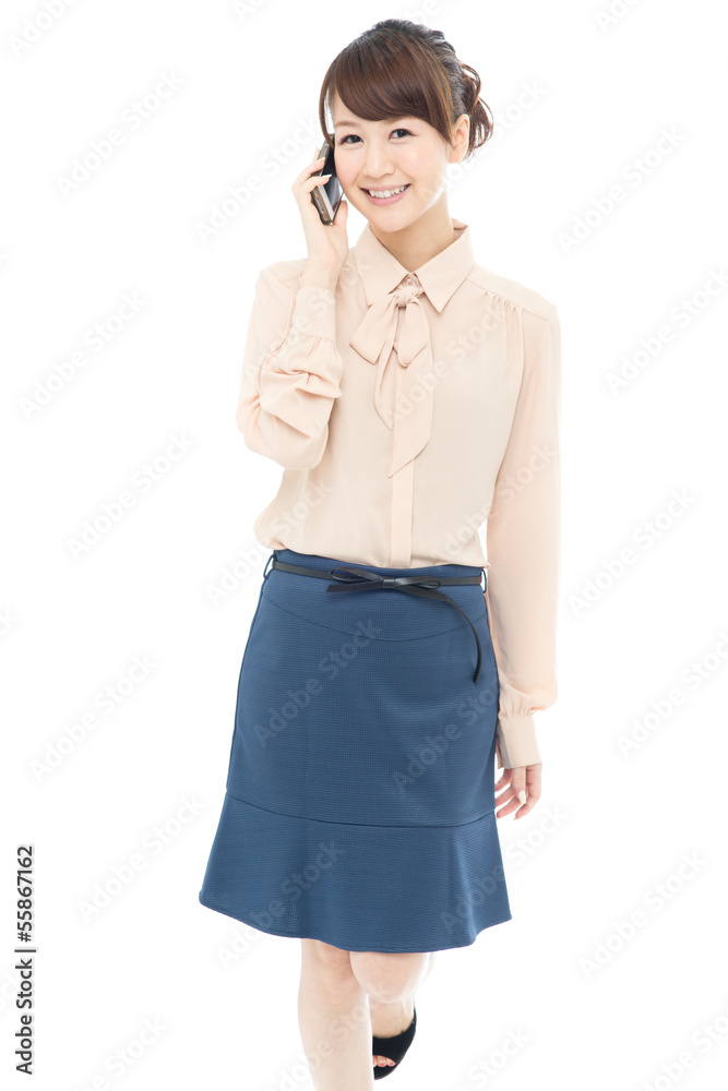 Beautiful asian business woman using a cellular Beautiful asian business woman using a cellular