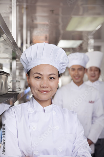 Portrait of a Chef in an Industrial Kitchen