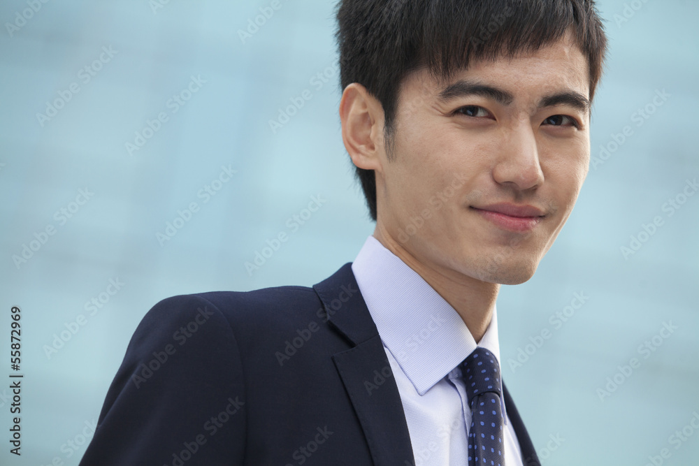 Close-up portrait of young businessman, China Close-up portrait of young businessman, China