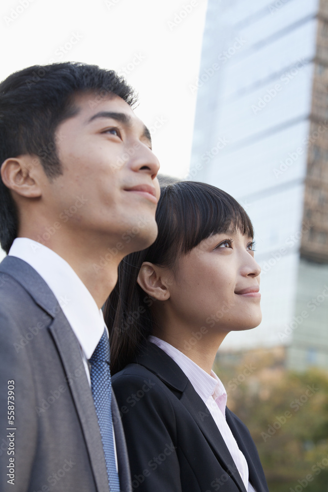 Young Business Colleagues Looking Away Young Business Colleagues Looking Away