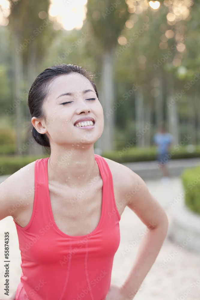 Young Woman After Workout in Park, Beijing,China Young Woman After Workout in Park, Beijing,China