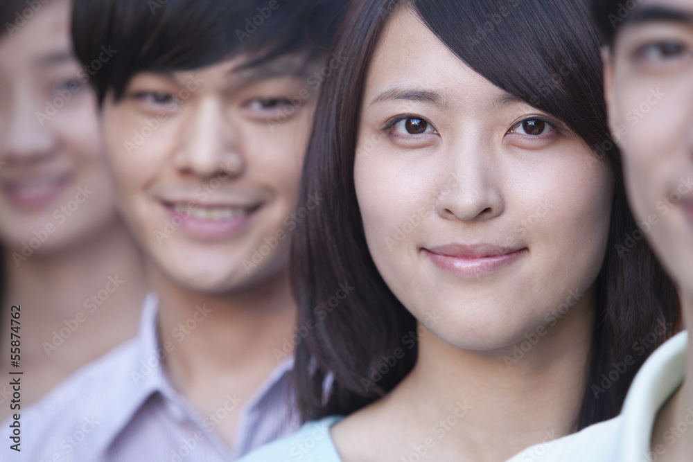 Close Up of Four Young People Standing in a Row in Beijing Close Up of Four Young People Standing in a Row in Beijing