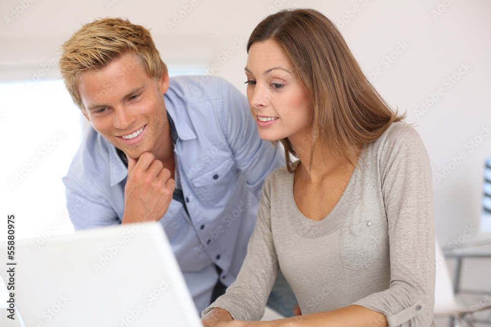 Business partners working together in office Business partners working together in office