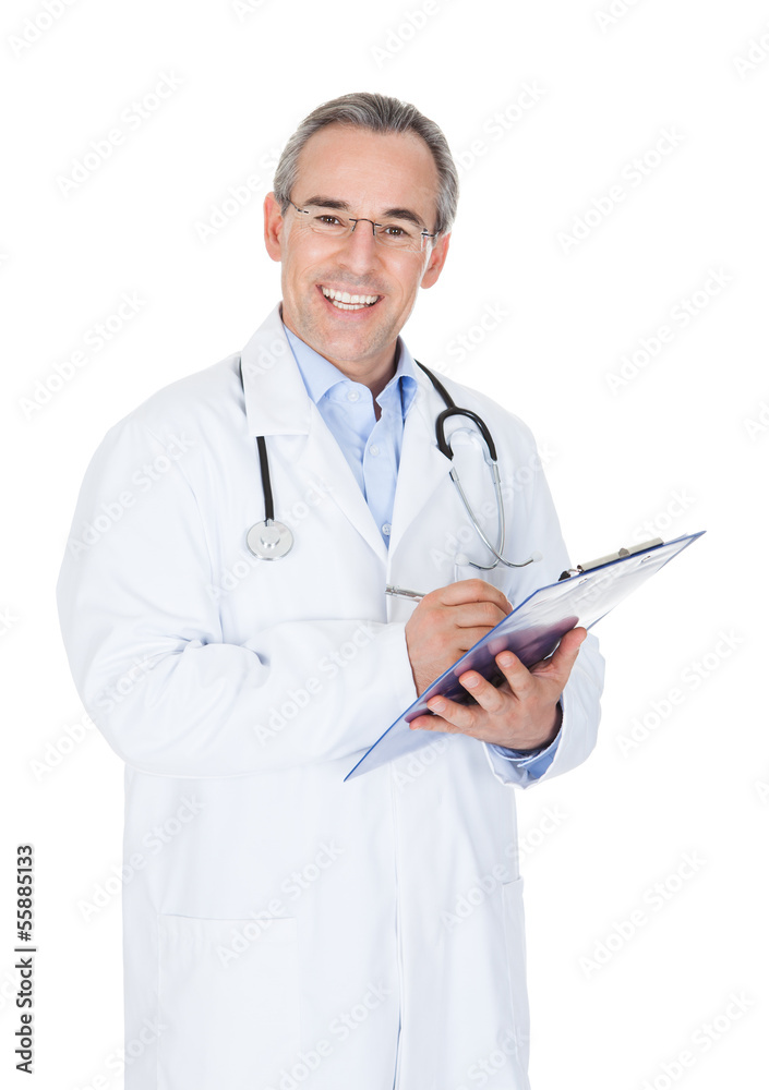 Happy doctor writing on clipboard Happy doctor writing on clipboard