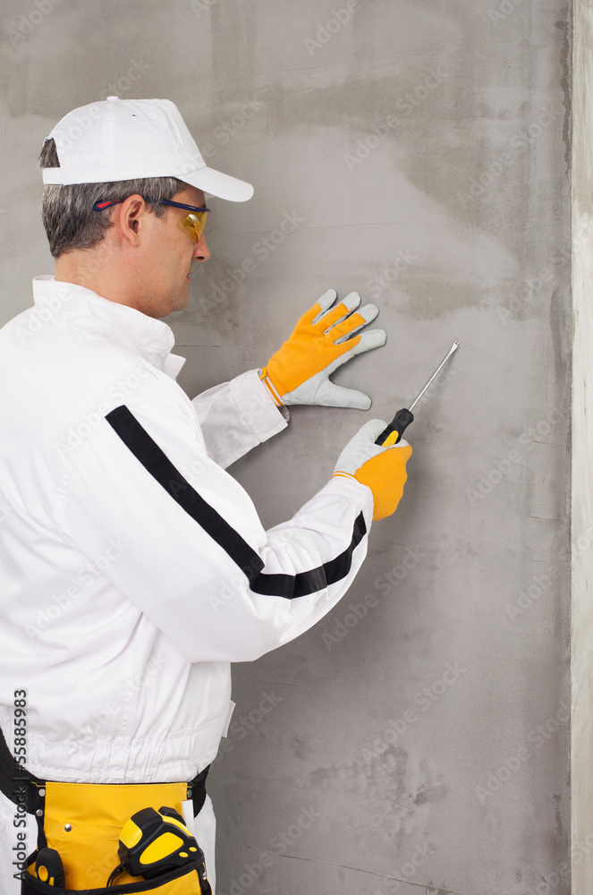 Worker checking the surface Worker checking the surface