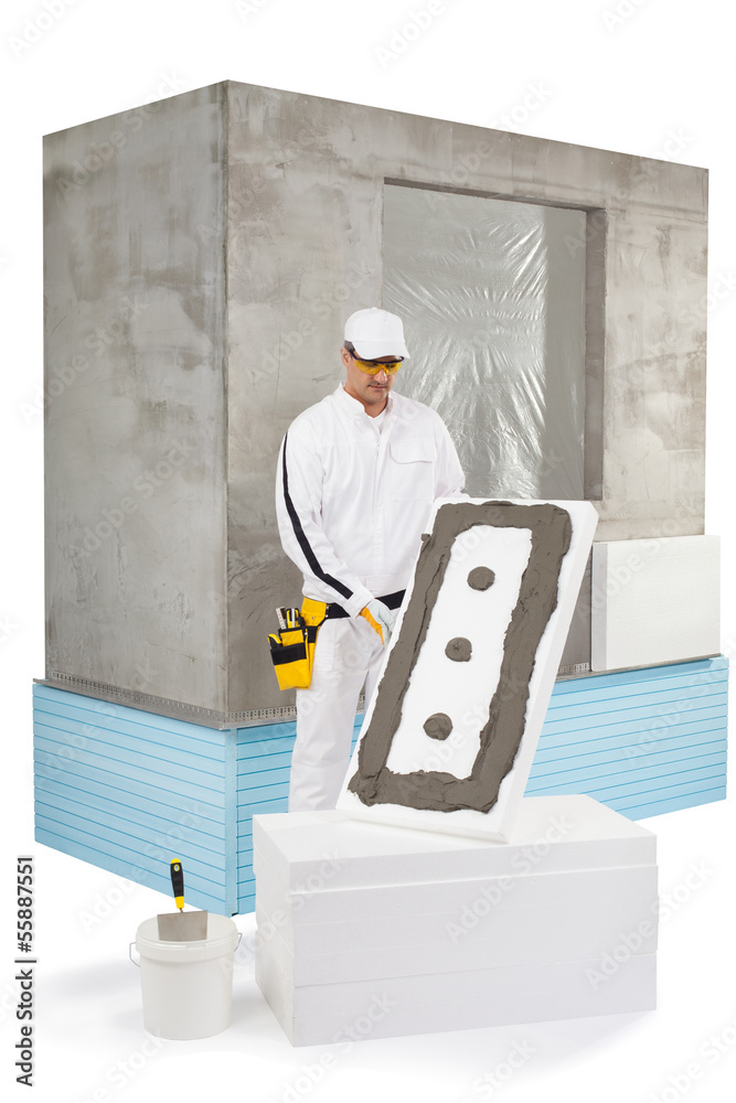 Worker holding an insulation panel coated with a lute Worker holding an insulation panel coated with a lute