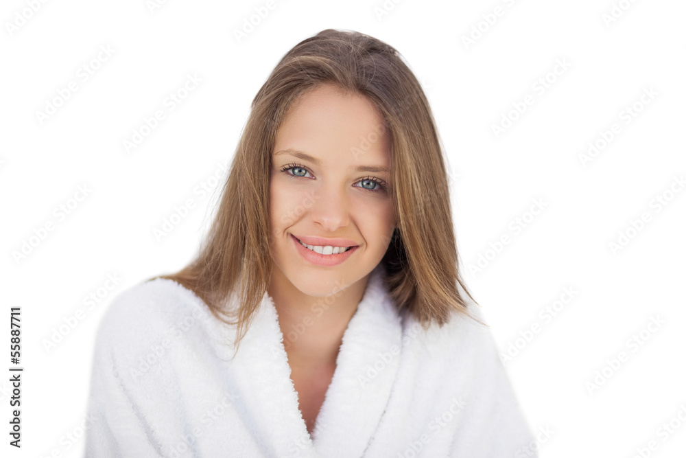 Smiling brunette in bathrobe looking at camera Smiling brunette in bathrobe looking at camera