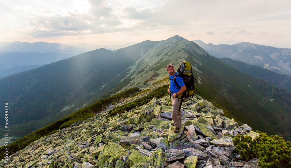 Hiker makes his way in Carpathian mountains