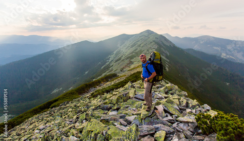 Hiker makes his way in Carpathian mountains © Maygutyak