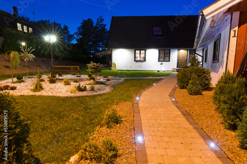 Entry to modern villa garden
