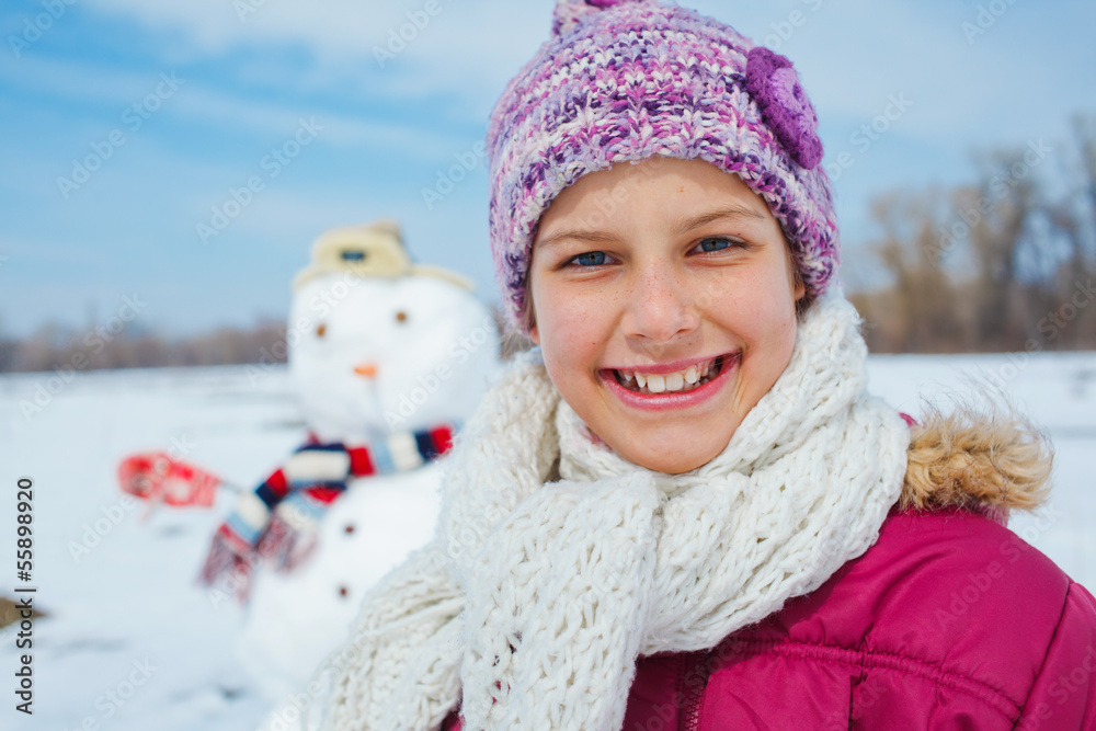 Girl with a snowman Girl with a snowman