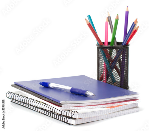 Notebook stack and pencils. Schoolchild and student studies acce