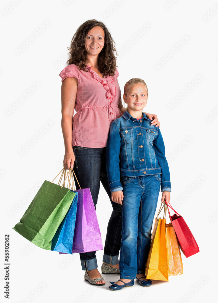 Smiling mother and daughter with shopping bags Smiling mother and daughter with shopping bags