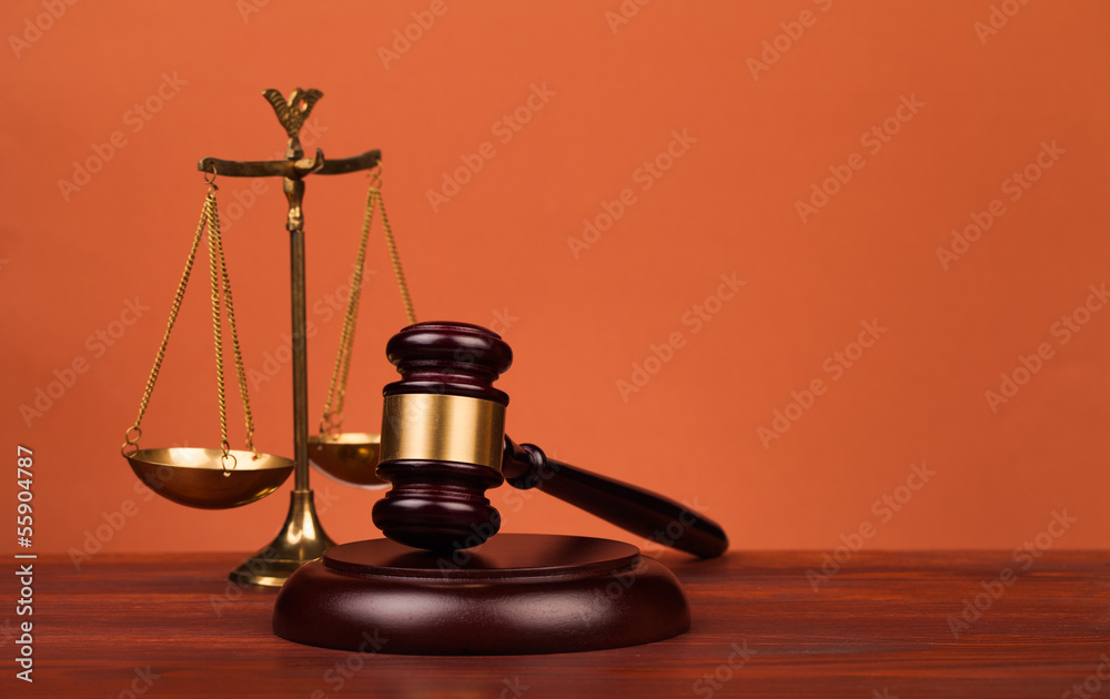 judge gavel and scales of justice on table judge gavel and scales of justice on table