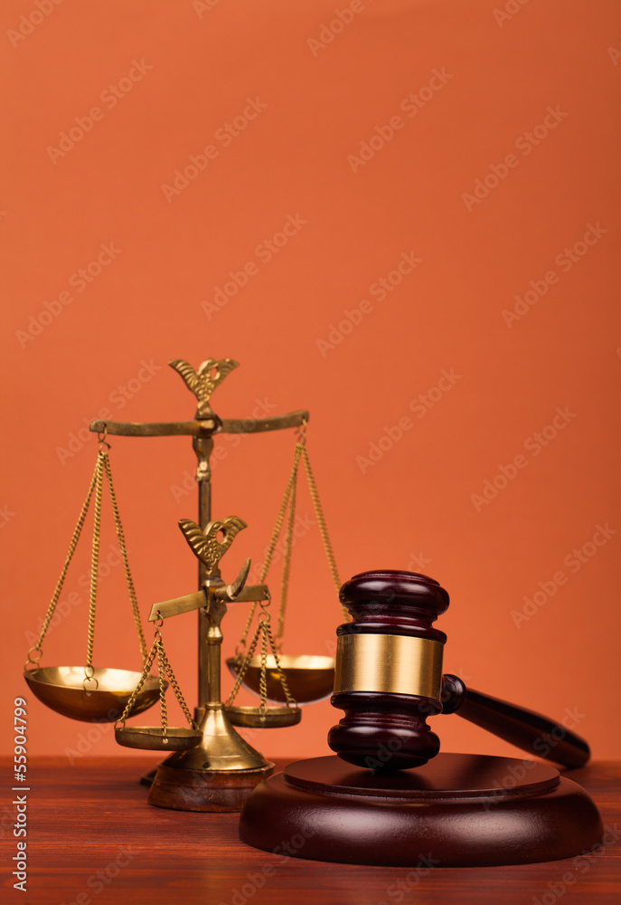 judge gavel and scales of justice on table judge gavel and scales of justice on table