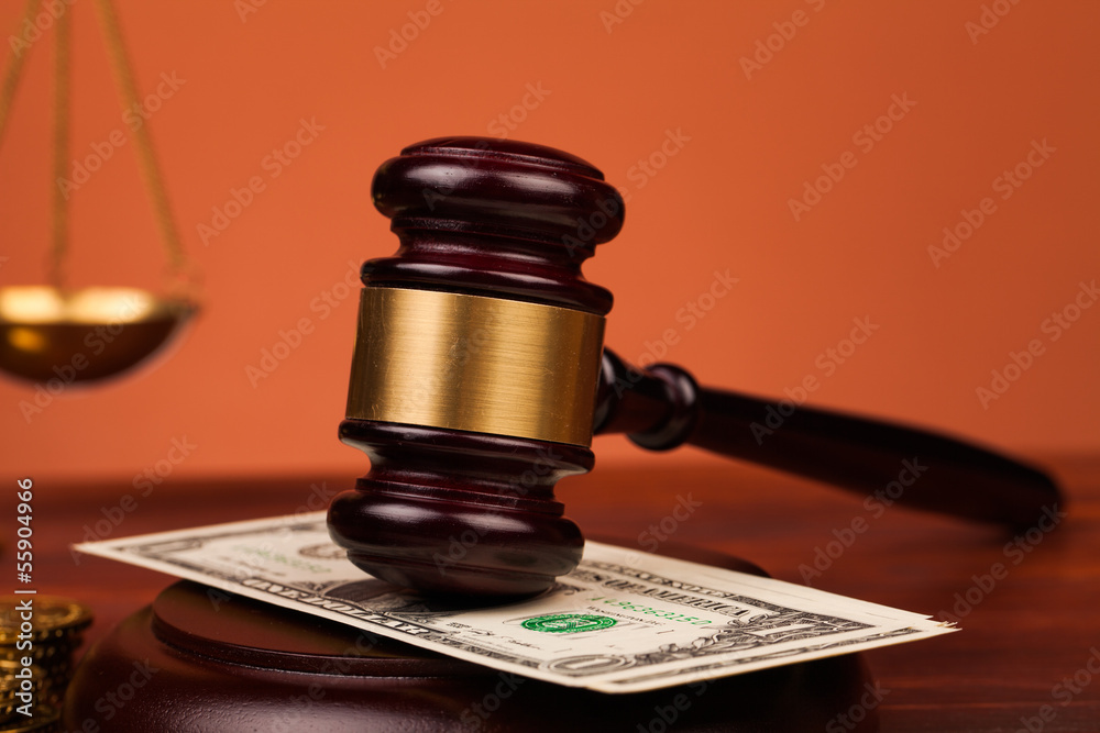 judge gavel dollar money and scales of justice on table judge gavel dollar money and scales of justice on table