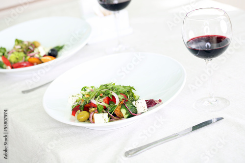 Greek salad on white plate  close up