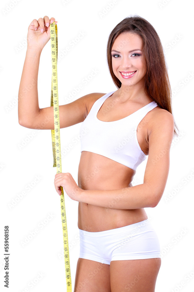 Beautiful young woman with measuring tape isolated on white Beautiful young woman with measuring tape isolated on white