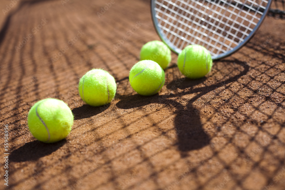 Tennis racket and balls, tennis court