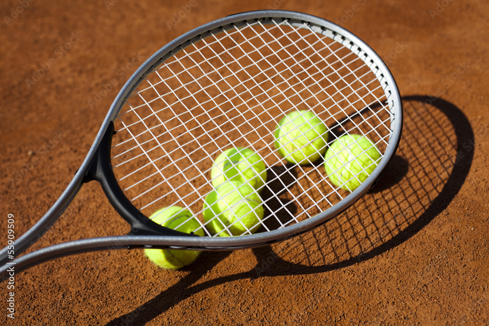 Tennis racket and balls, tennis court