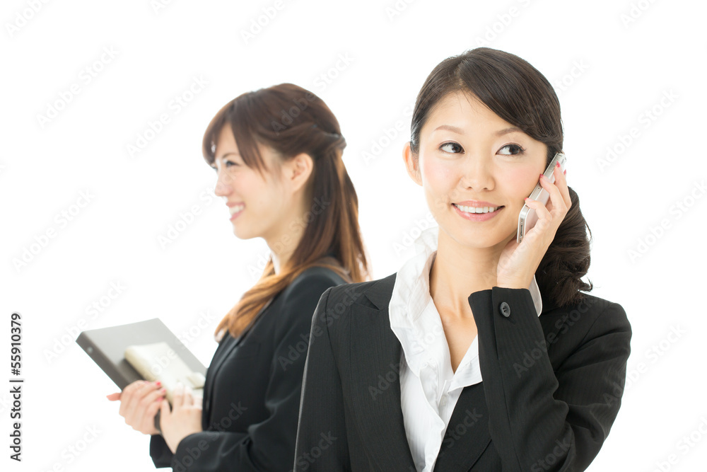 Beautiful asian businesswomen isolated on white background