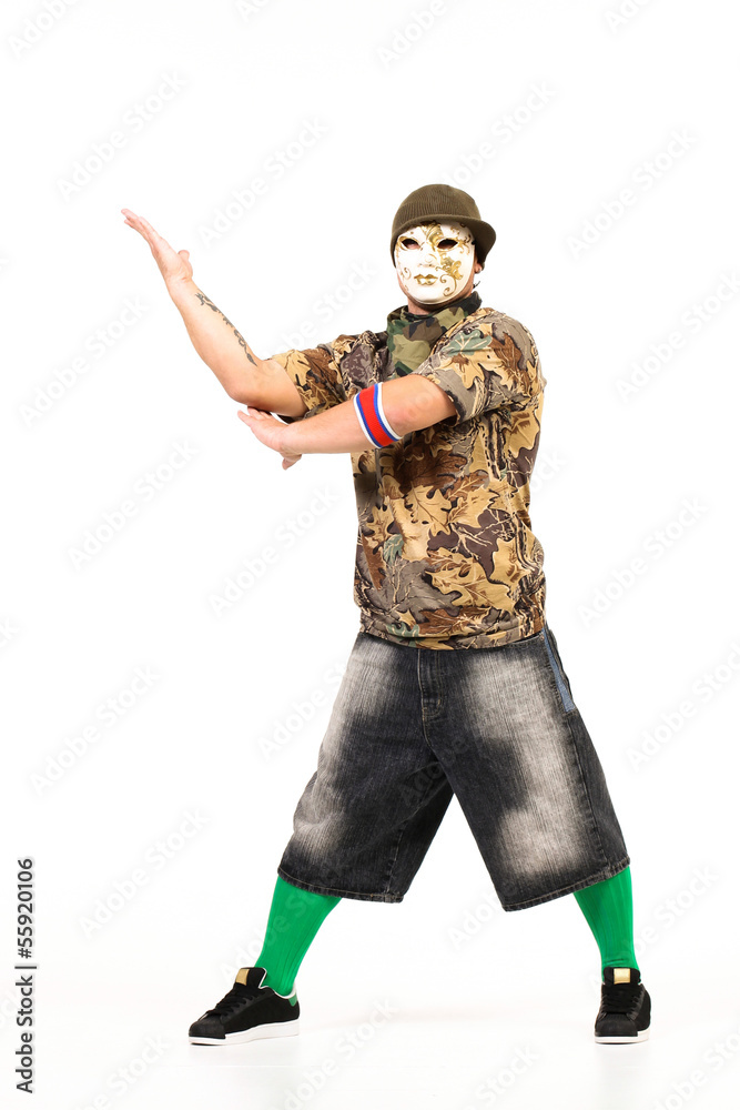 Man in mask performing hip hop dancing steps Man in mask performing hip hop dancing steps
