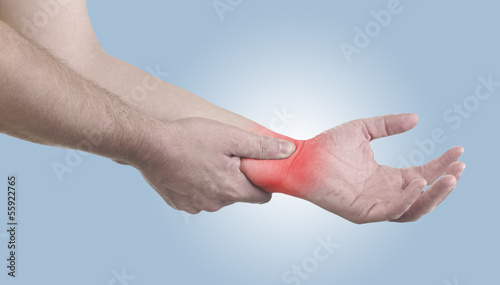 Pain in a man wrist. © Lovrencg